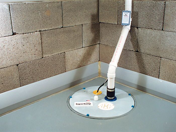 A baseboard basement drain pipe system installed in Columbus